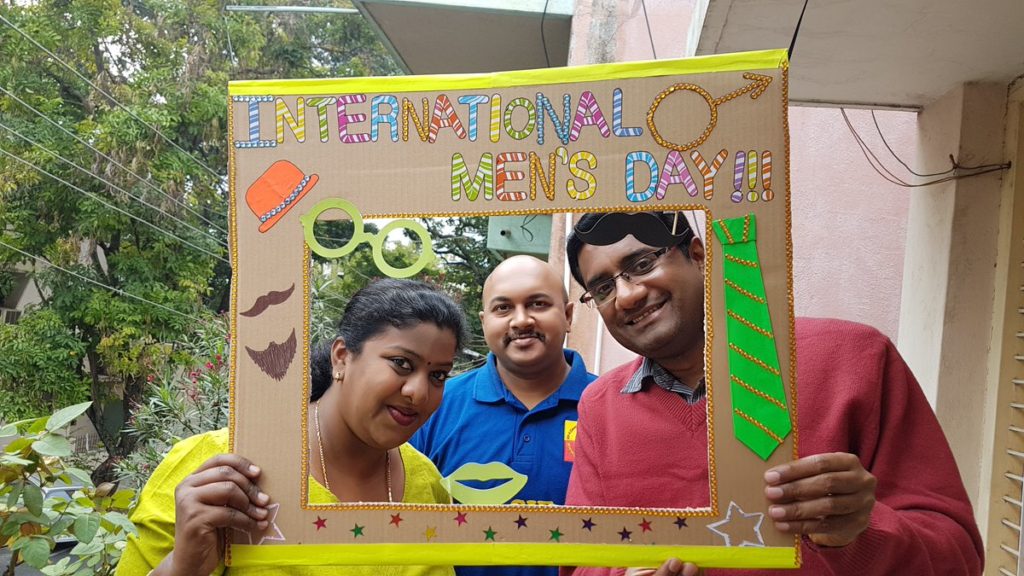 Teachers at Iti Suvidya also joined in the Men's Day awareness activity and made the Selfie banner.